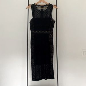 This authentic BCBG (LBD) with lace detail